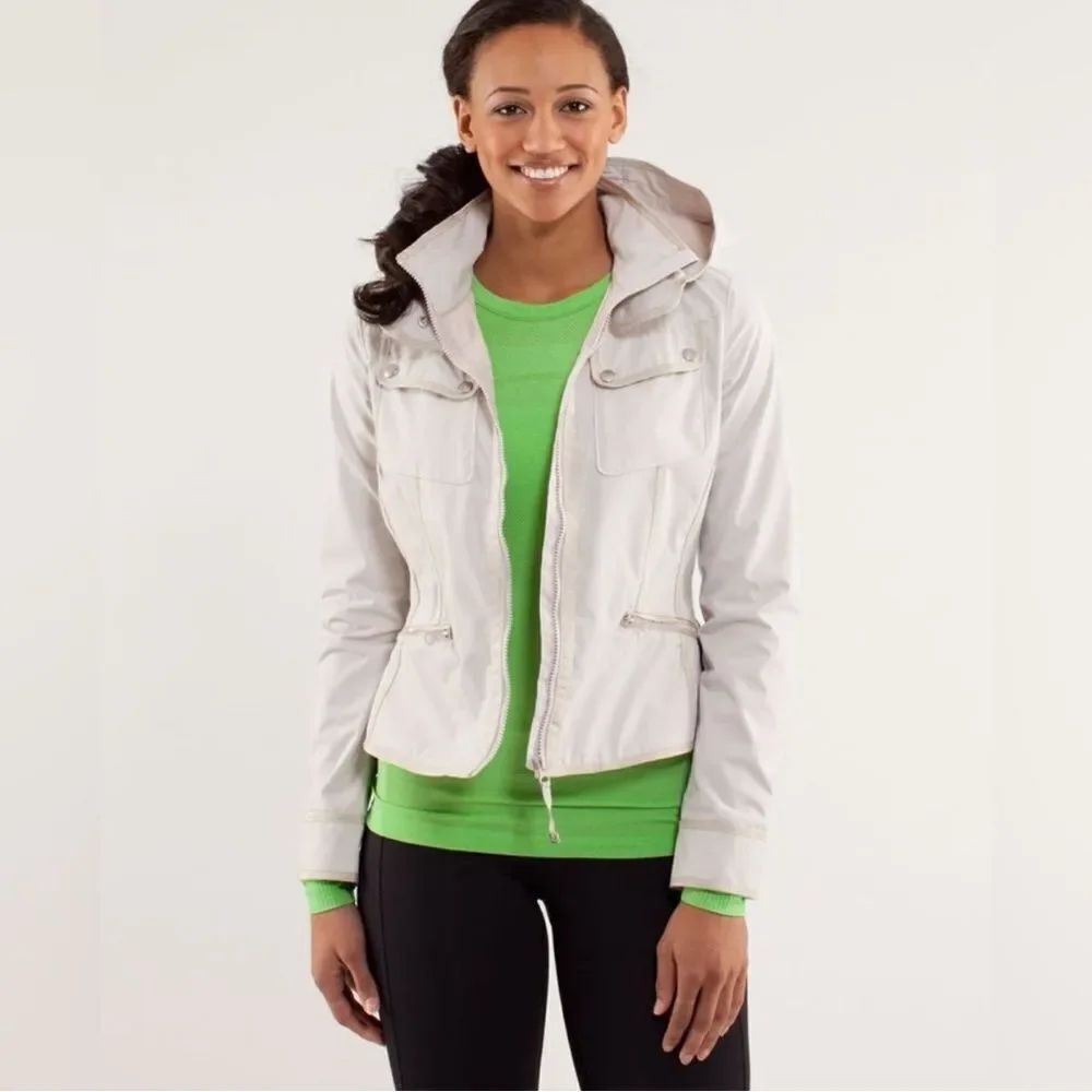 Lululemon Out and About Peplum water repellent cream Jacket Ecru size 4 with hoo